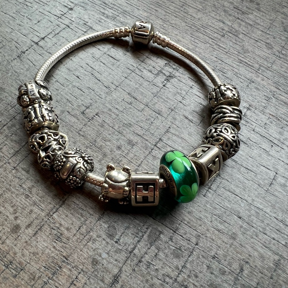 Pandora charm bracelet and 11 charms included